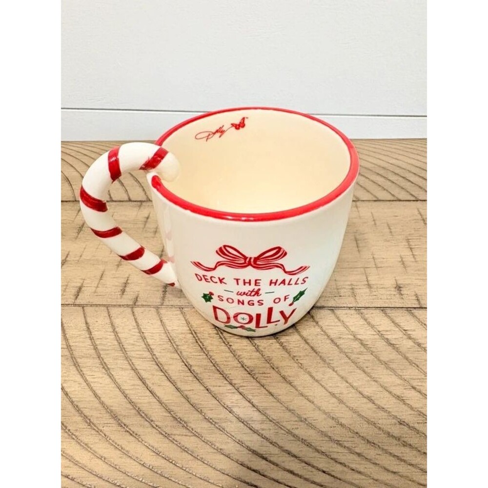Dolly Parton Christmas mug with red bow and holly 'Deck the Halls
